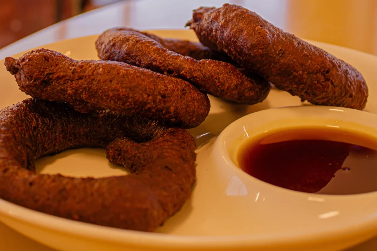 Picarones de chocolate Picarones de chocolate, dulces fritos con un toque de cacao.